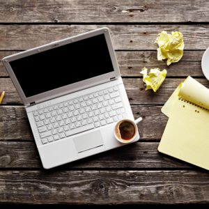 bigstock-Laptop-with-crumpled-paper-bl-36467365 (1)