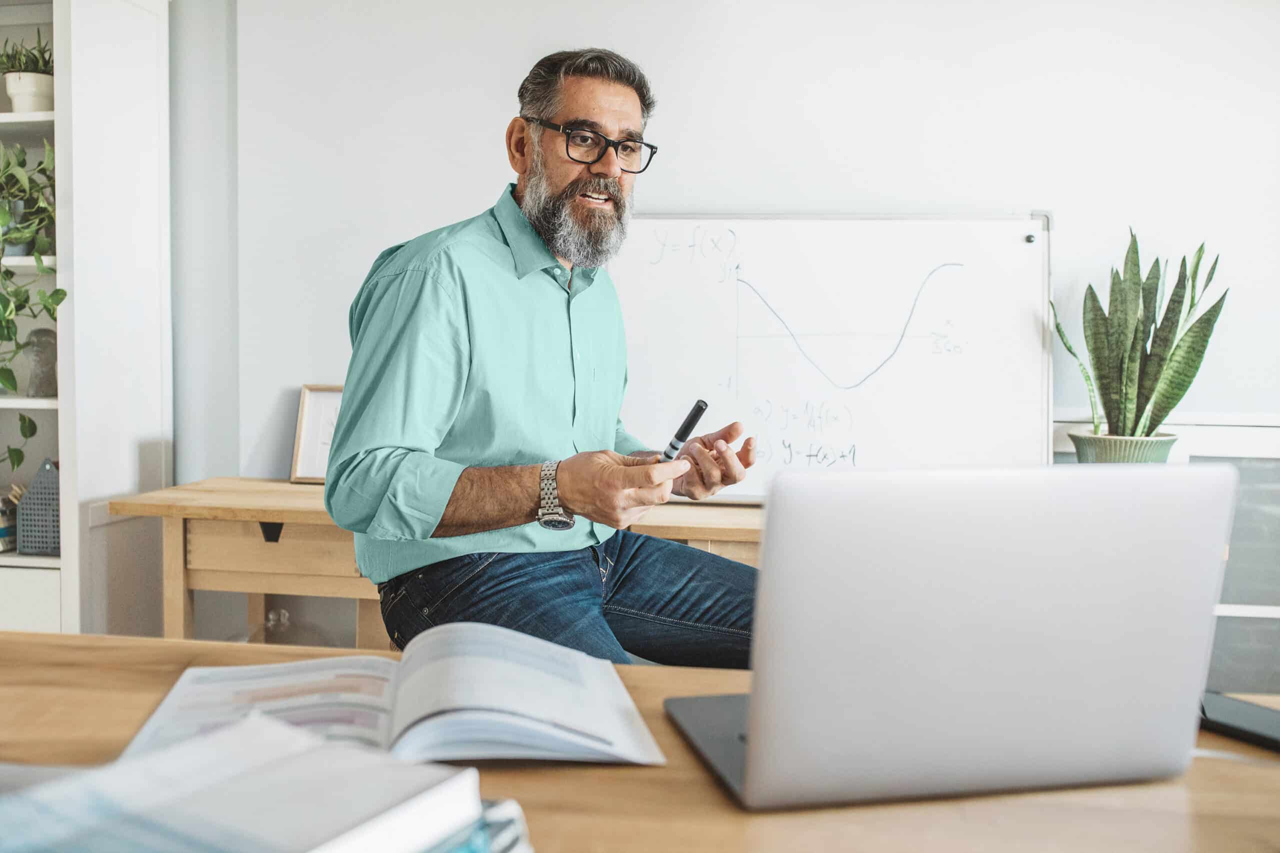 Person sitting in front of laptop