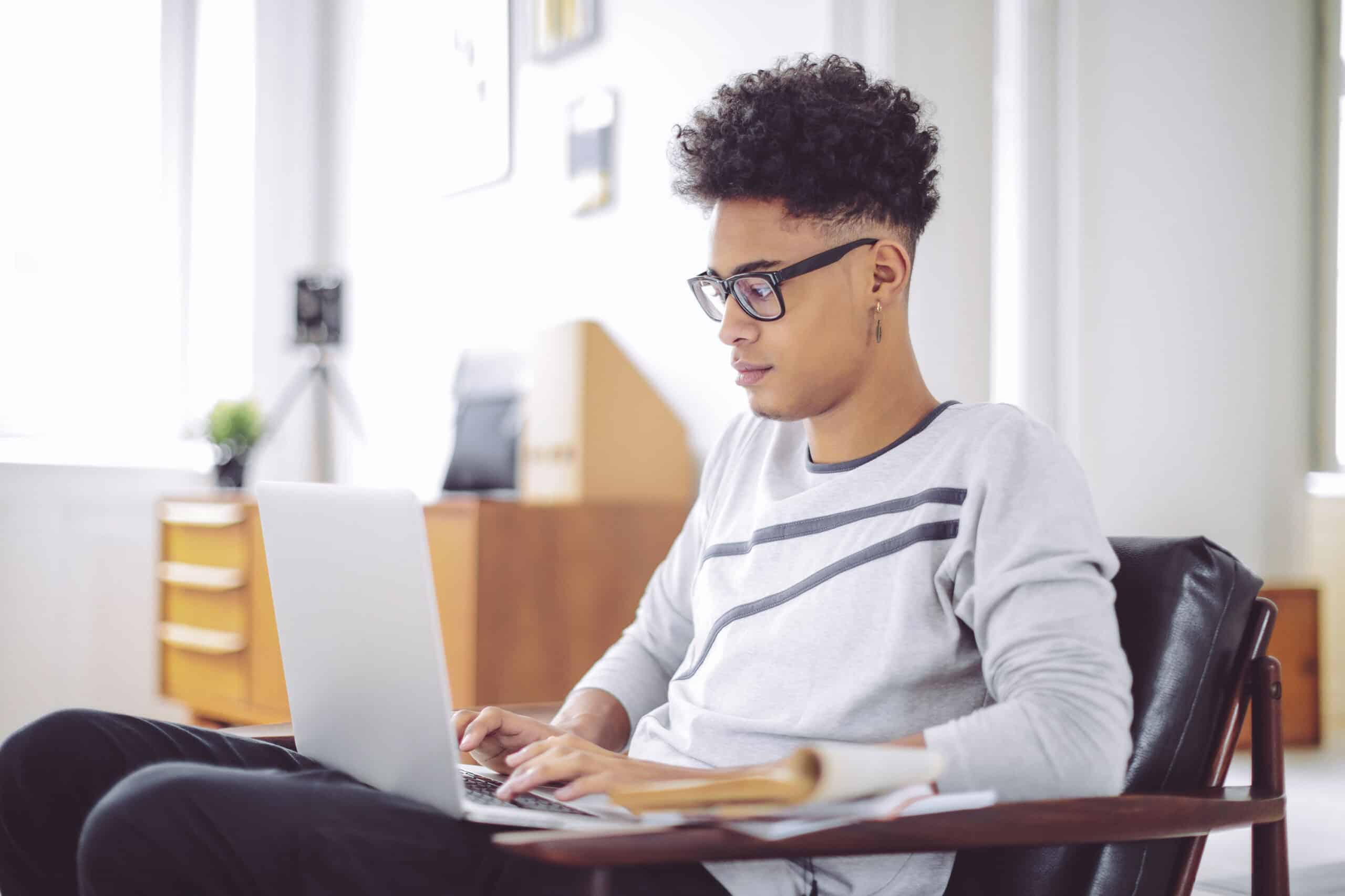 Person typing on laptop